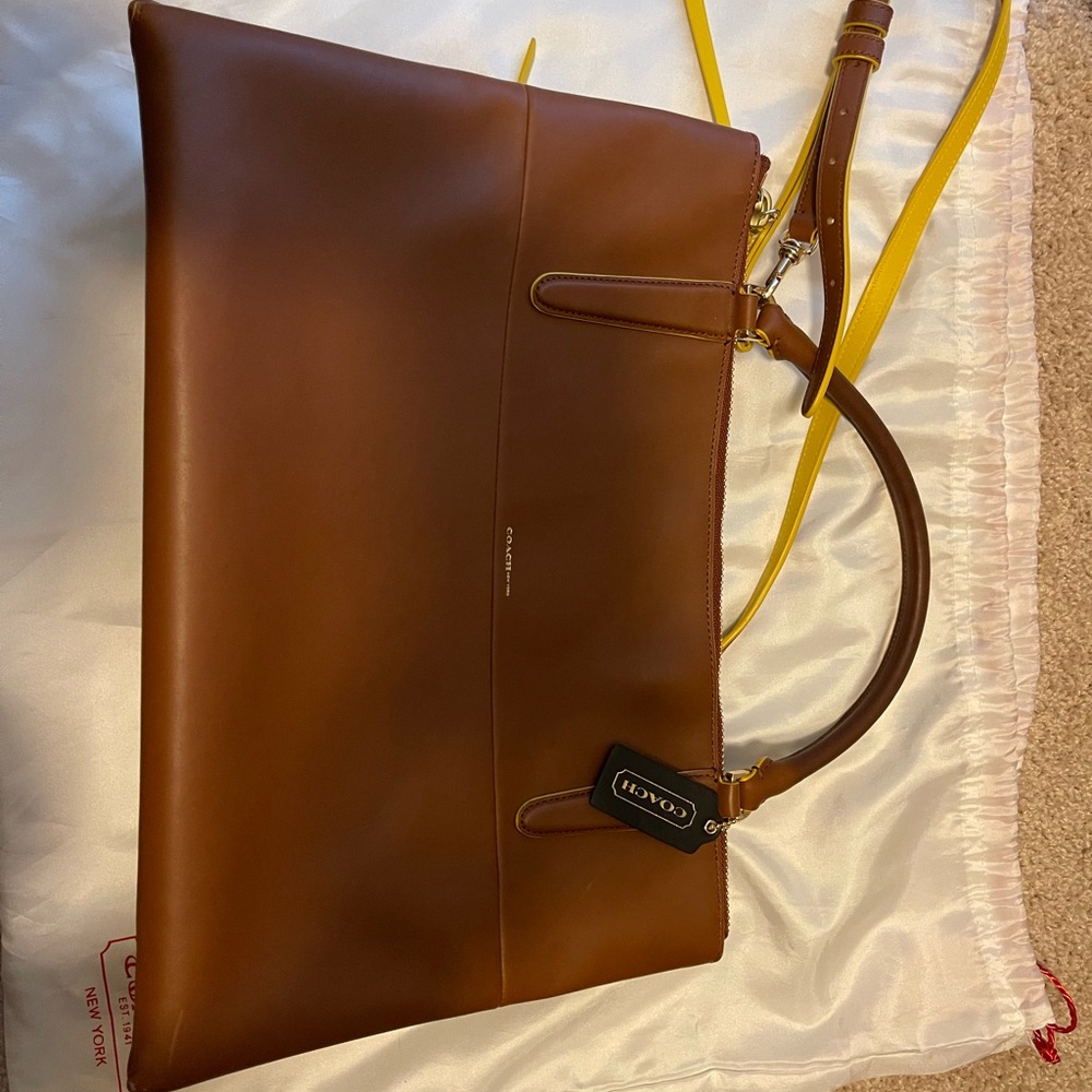 Coach all genuine leather large bag with handles and shoulder strap.